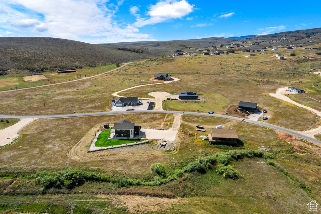 View of property location with mountains and rural landscape