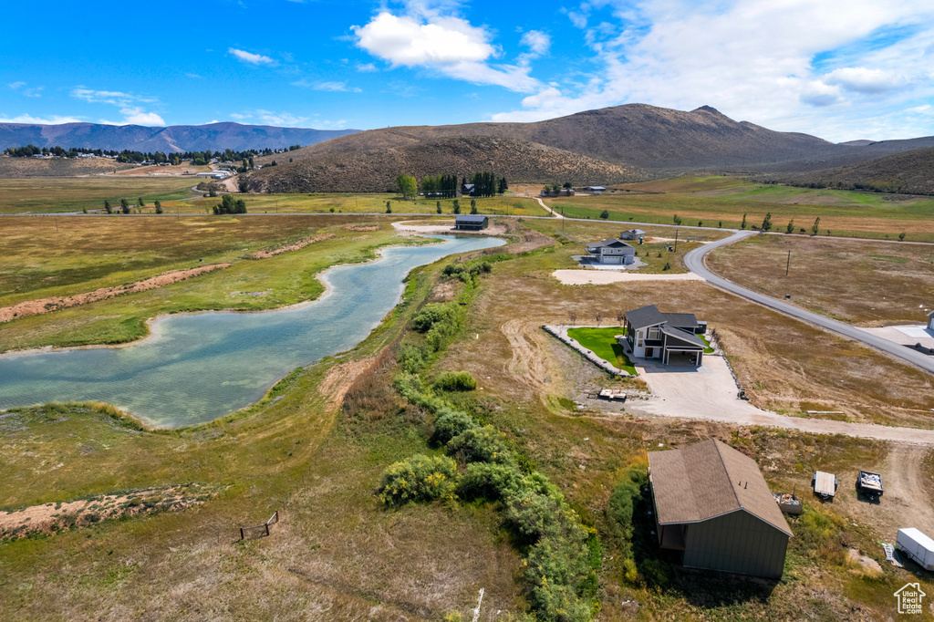 Aerial view of sparsely populated area with a mountainous background