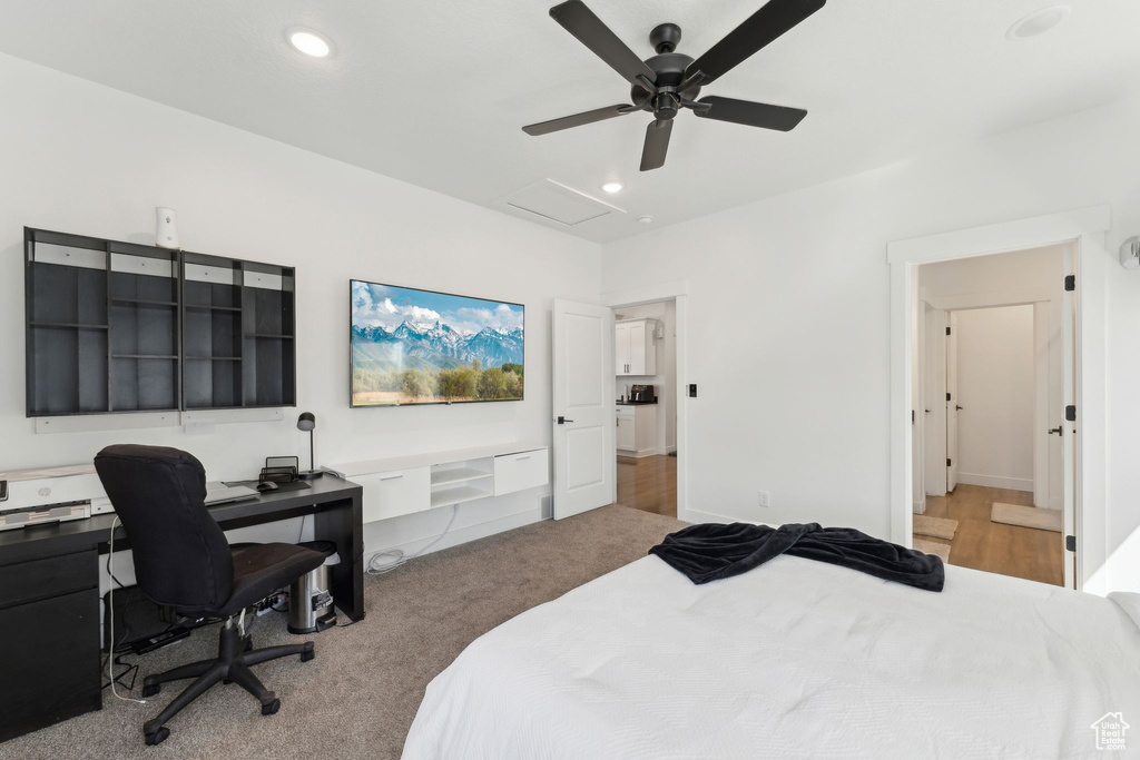 Bedroom with attic access, recessed lighting, carpet floors, an office area, and a ceiling fan
