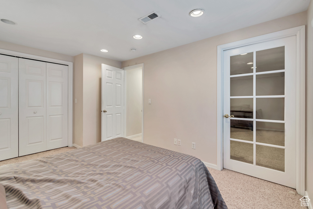 Bedroom with recessed lighting and baseboards