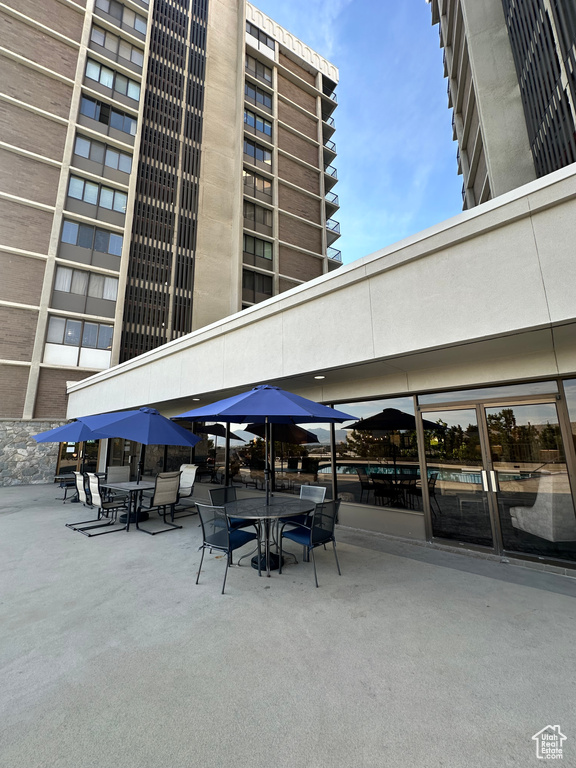 View of patio with outdoor dining area