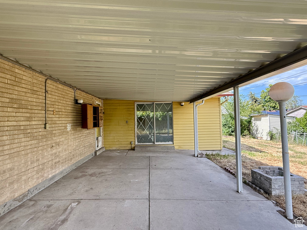 View of patio / terrace with an attached carport
