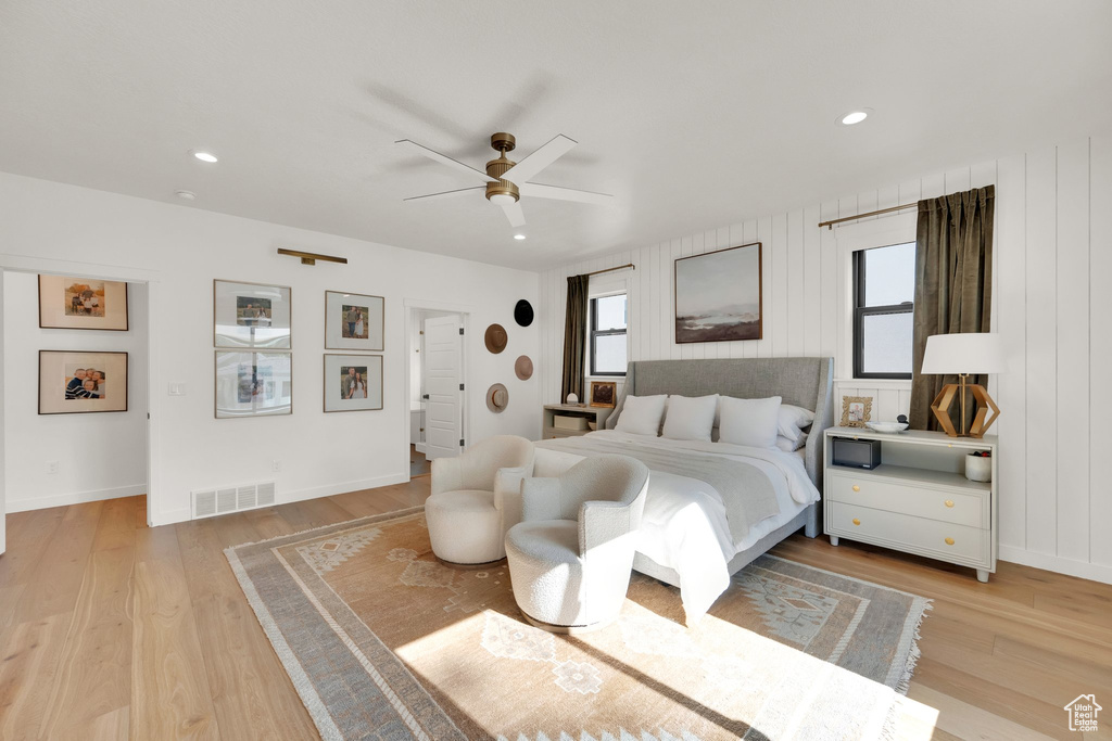 Bedroom with light wood-style floors, baseboards, a ceiling fan, and recessed lighting