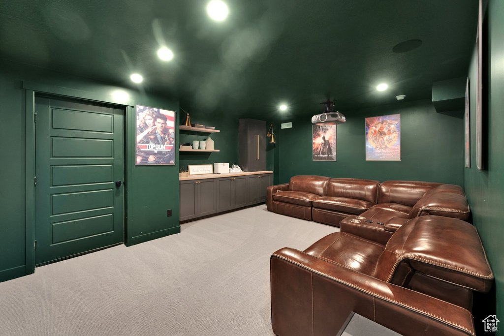 Cinema room featuring carpet flooring and recessed lighting