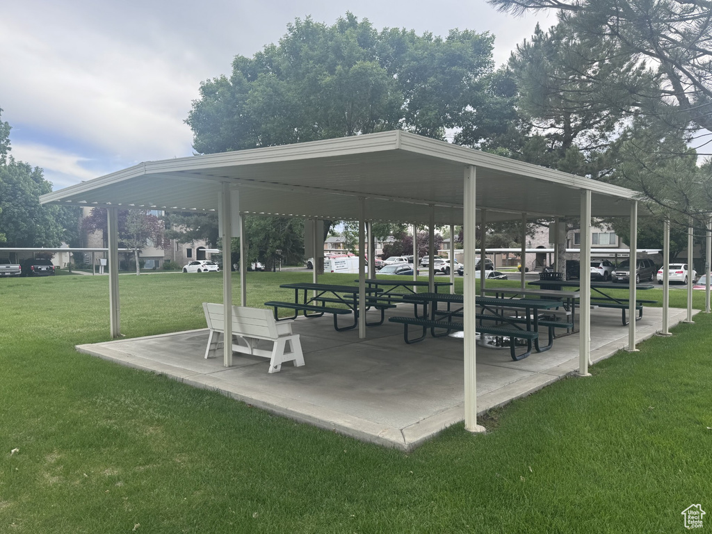 View of property's community with a lawn and a gazebo