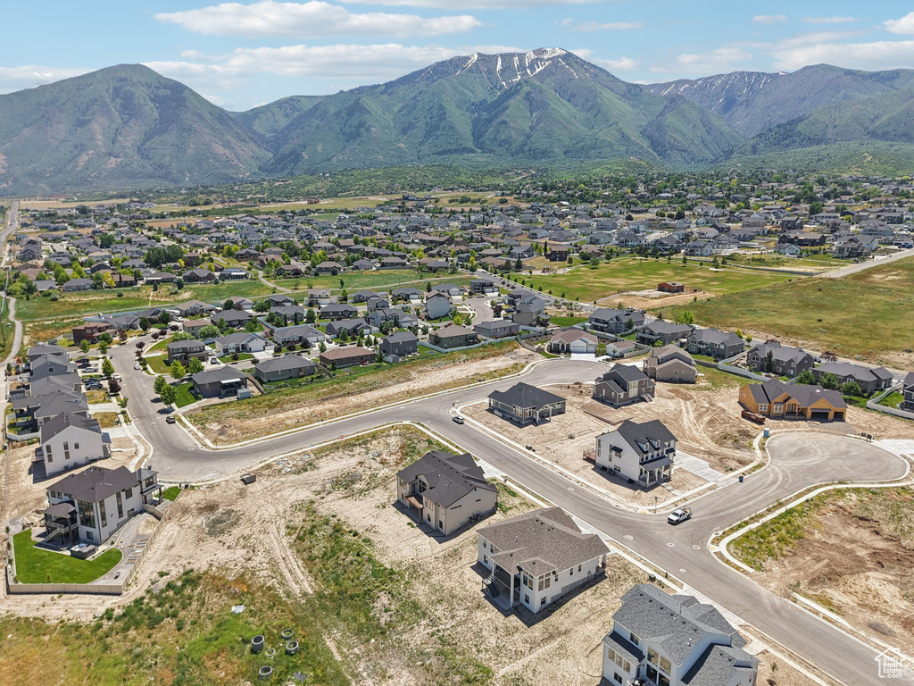 Aerial view of residential area featuring mountains