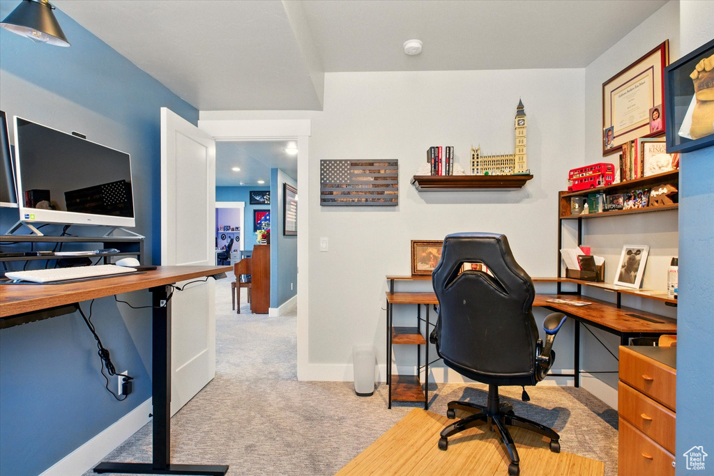 Office with carpet and baseboards