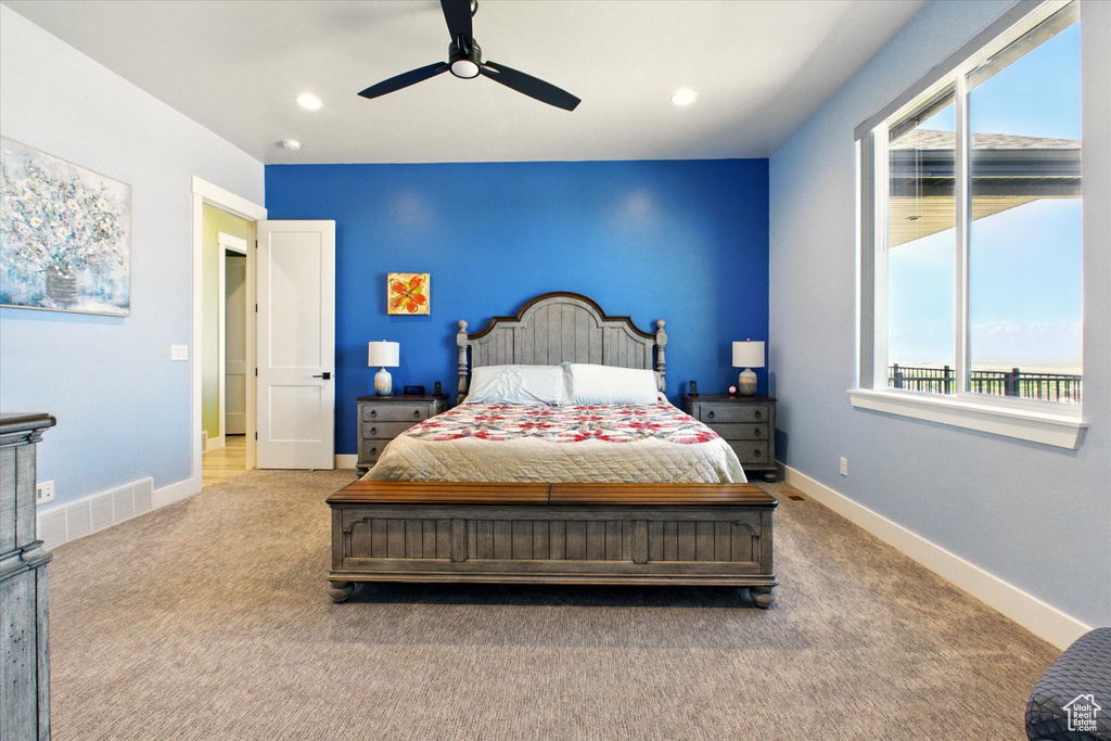 Bedroom with carpet, baseboards, recessed lighting, and ceiling fan