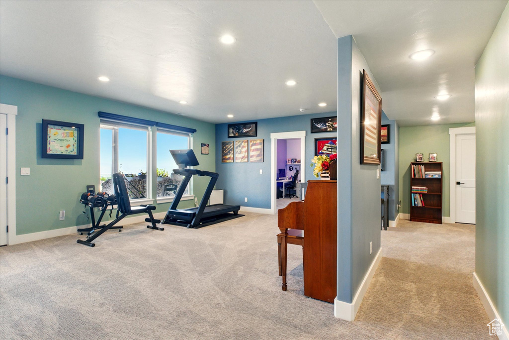 Workout area with carpet, baseboards, and recessed lighting