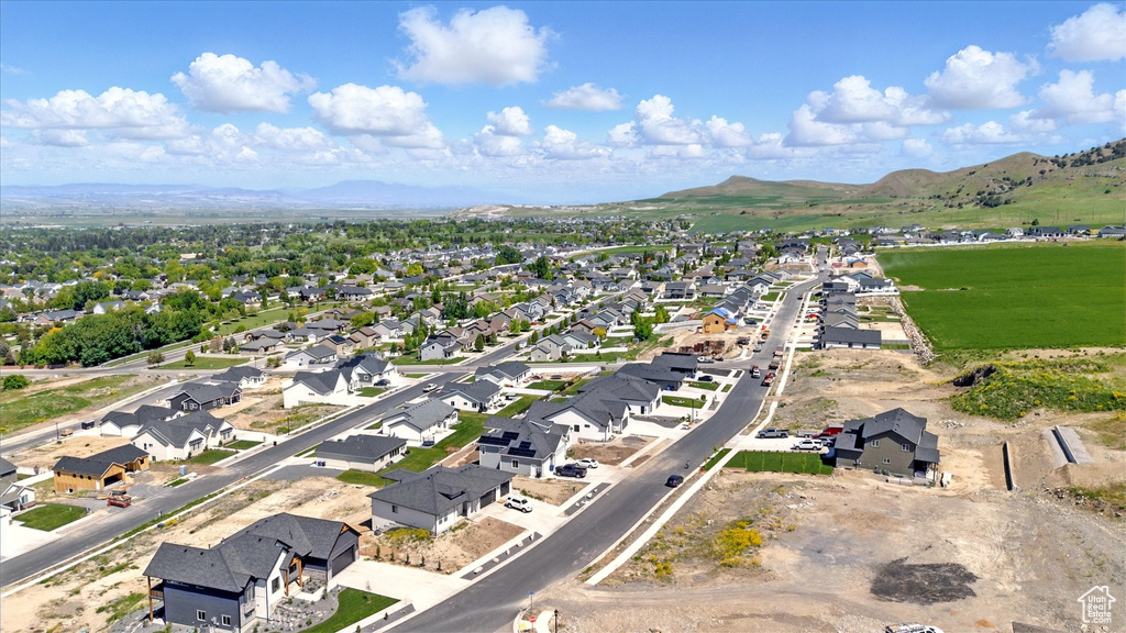Aerial view of residential area with a mountainous background