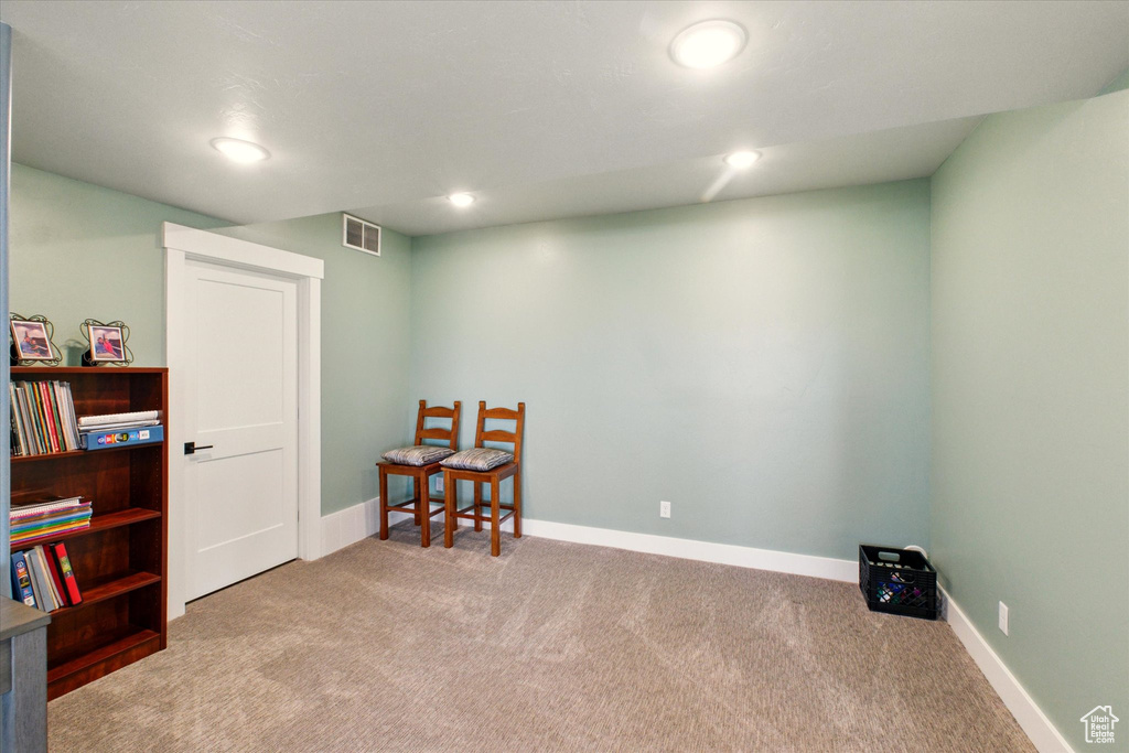 Misc room featuring carpet, baseboards, and recessed lighting