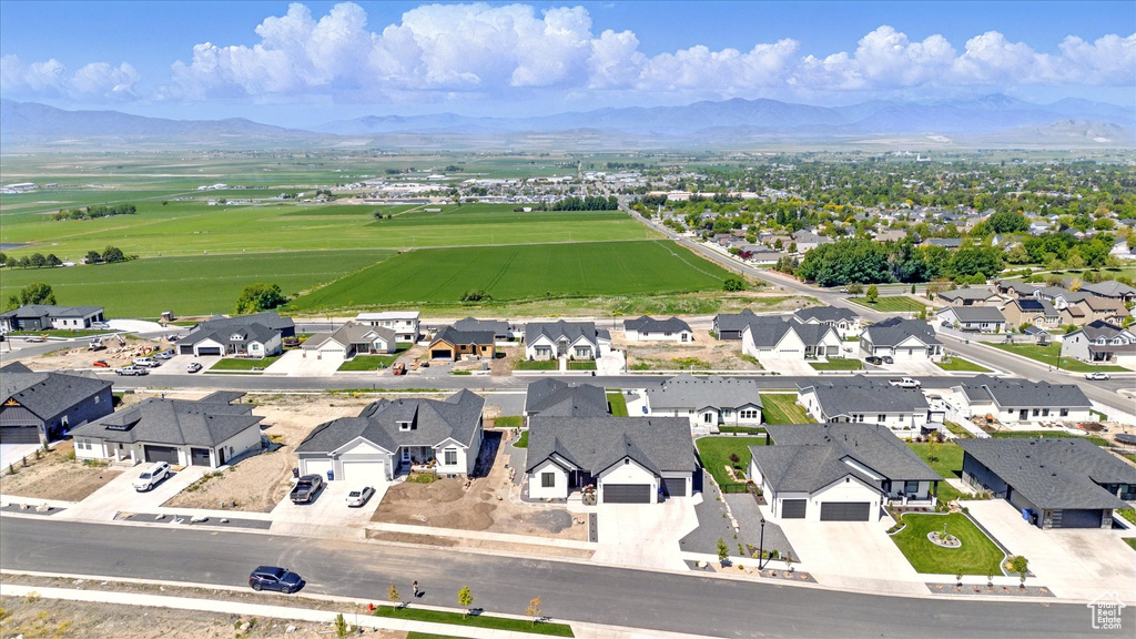 Aerial view of residential area with mountains