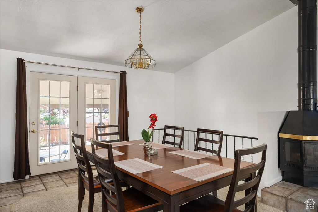 Dining room with light stone finish flooring