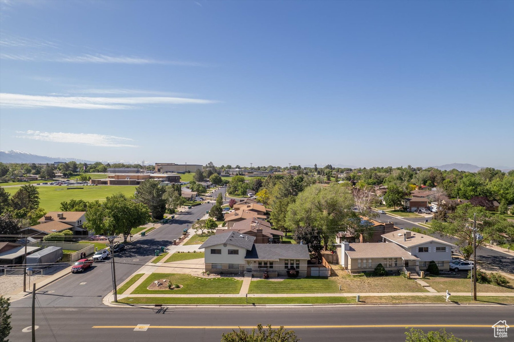 Aerial view of residential area featuring mountains