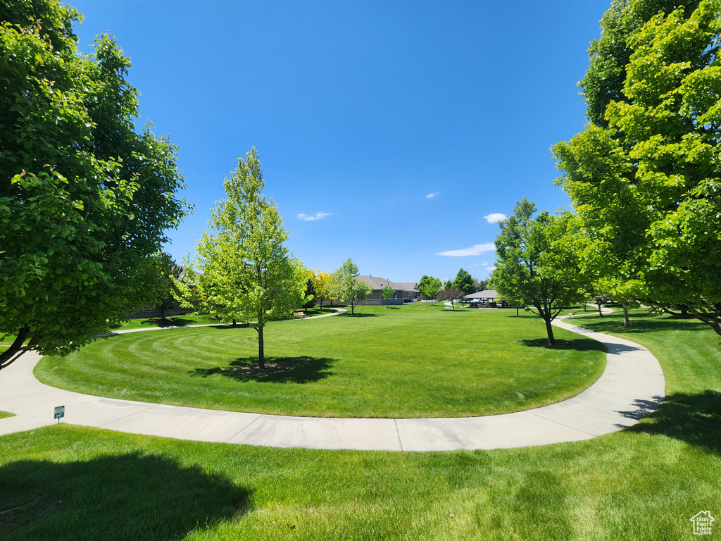 View of home\'s community featuring a yard
