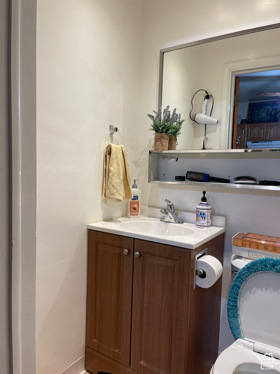 Bathroom with vanity and toilet