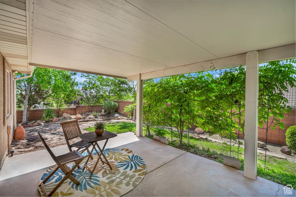 Fenced backyard with a patio area