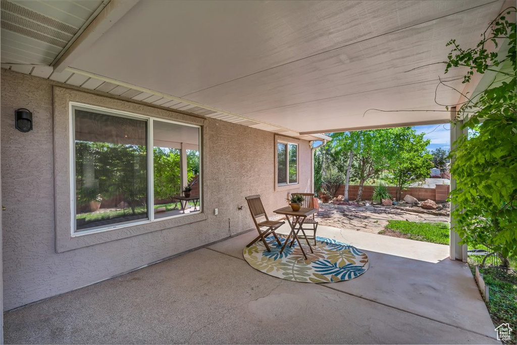 Fenced backyard featuring a patio