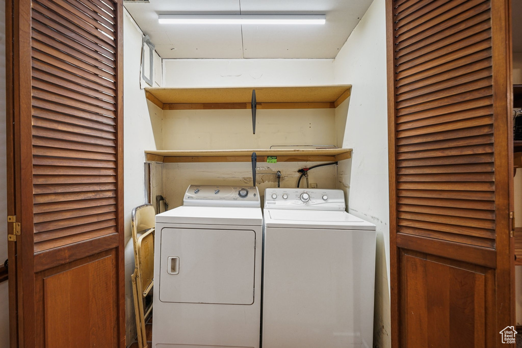 Laundry area featuring independent washer and dryer