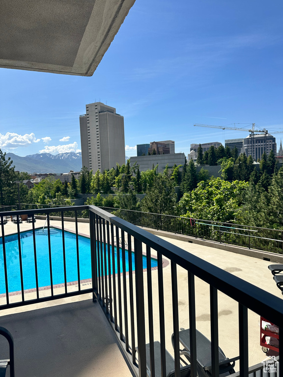 Balcony with view of pool