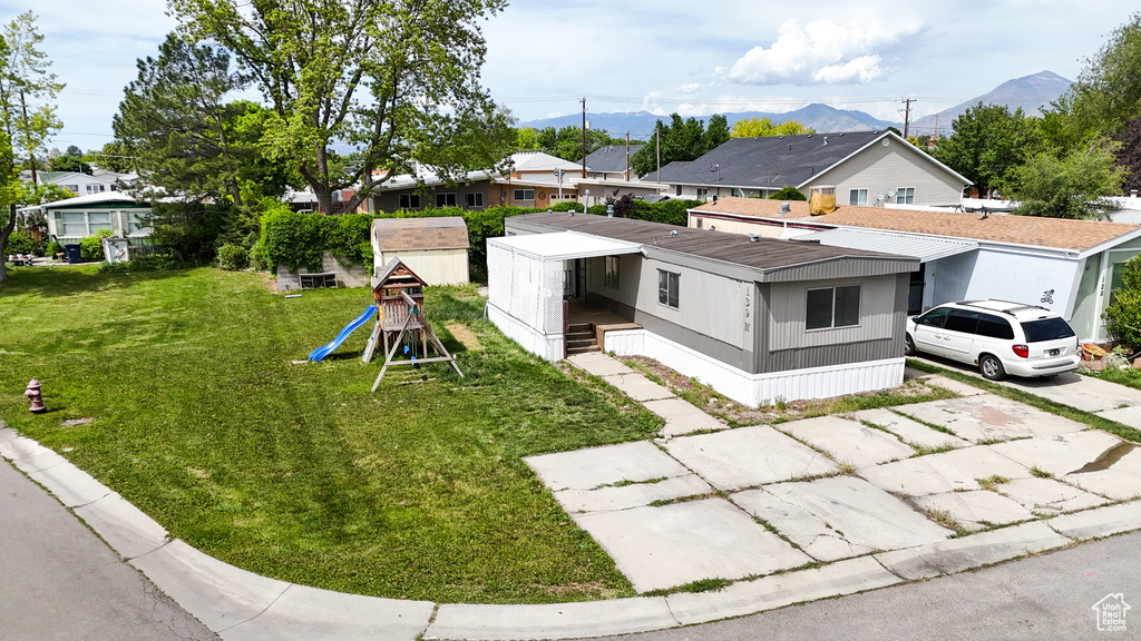 Exterior space with a mountain backdrop