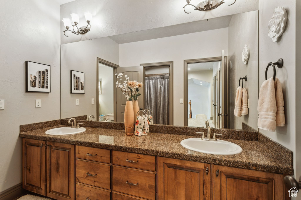 Bathroom featuring double vanity