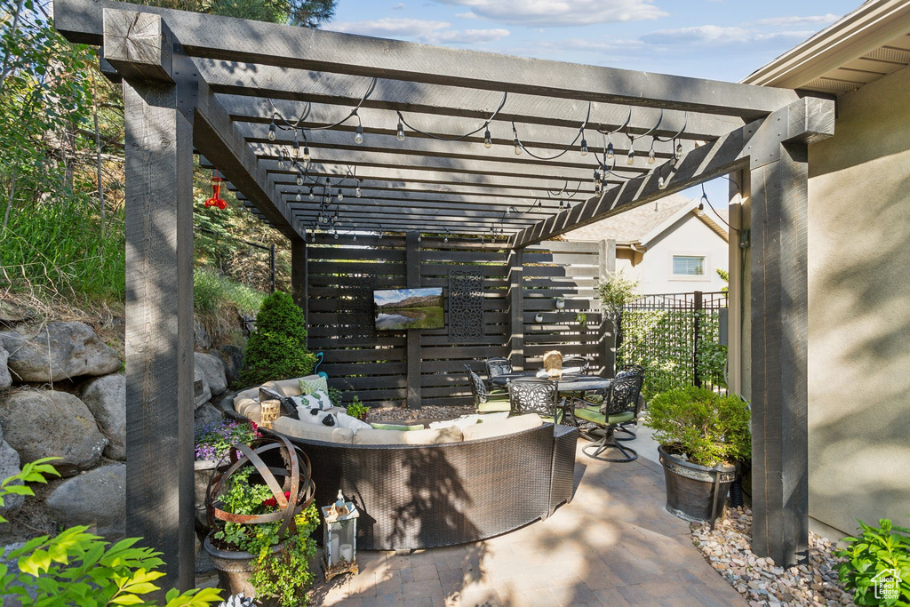 View of patio / terrace with a pergola and outdoor dining space