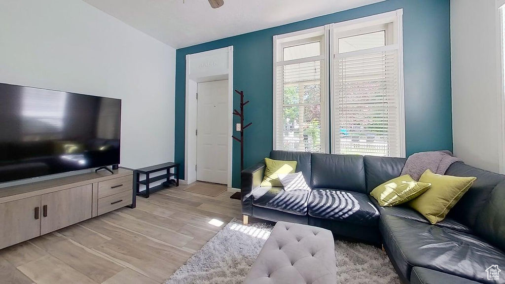 Living room with light wood-style floors