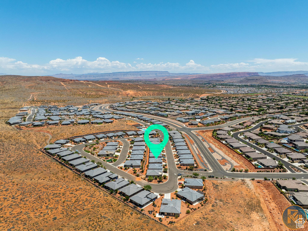 Aerial perspective of suburban area with mountains