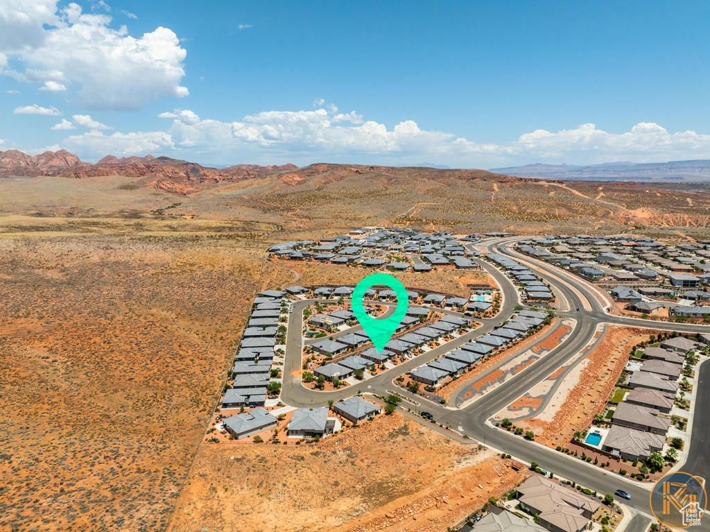 Aerial view of residential area with mountains
