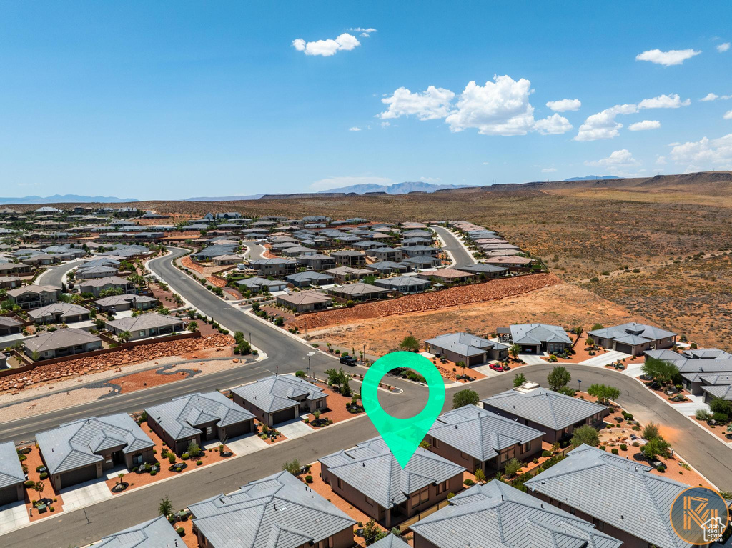 Aerial view of residential area with a mountain backdrop