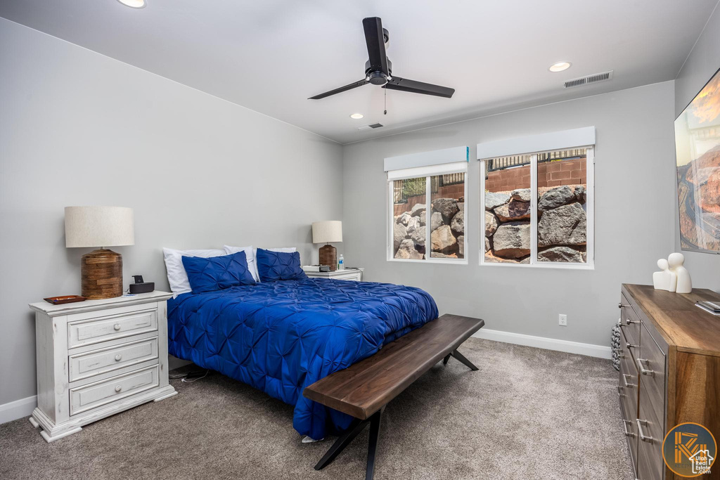 Carpeted bedroom with recessed lighting, baseboards, and a ceiling fan