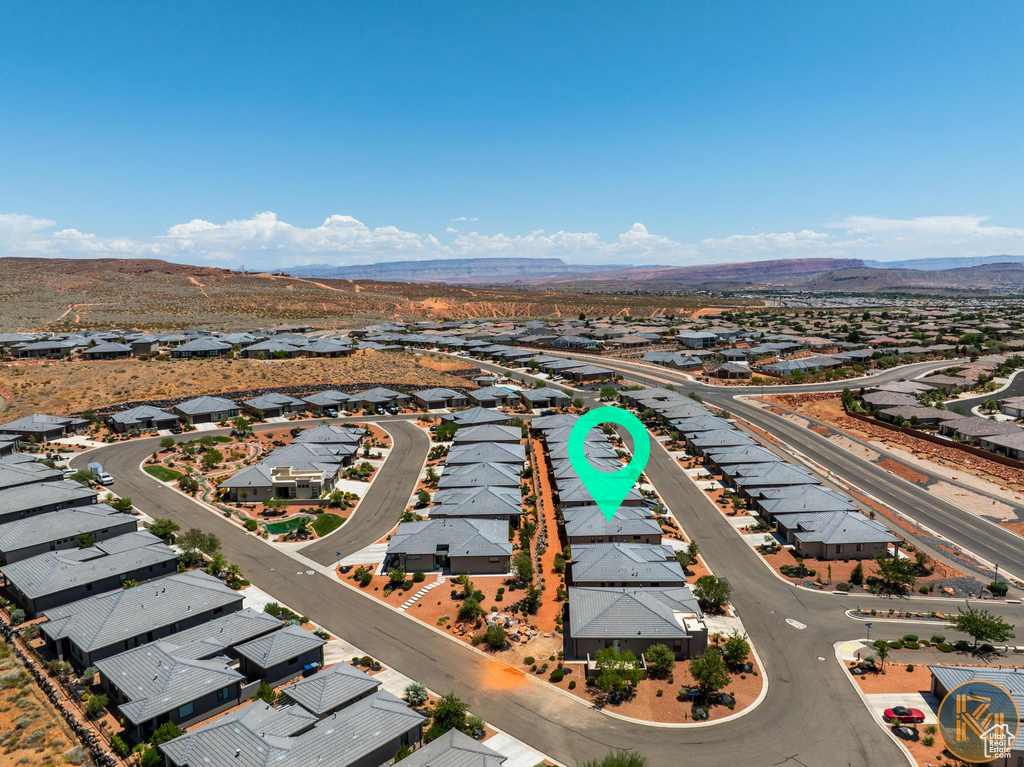 Aerial perspective of suburban area with mountains
