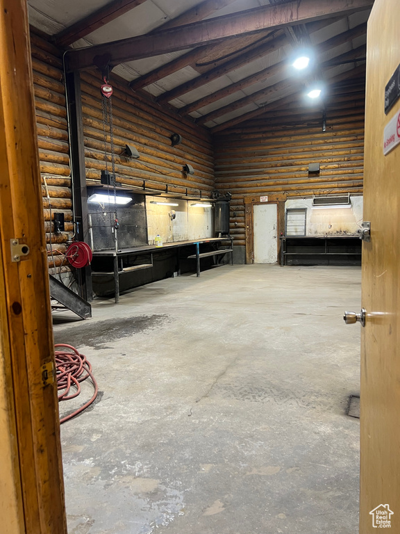 Garage featuring a workshop area