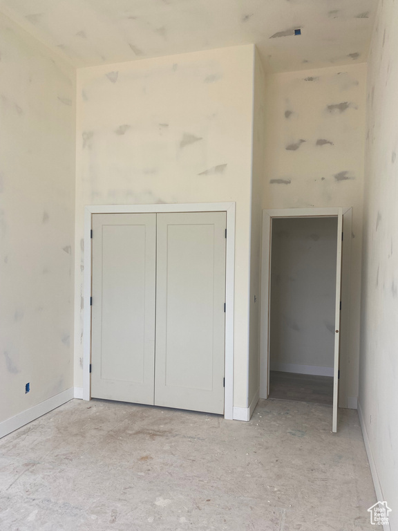 Unfurnished bedroom featuring a closet