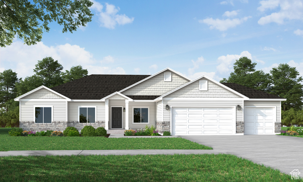 View of front of property featuring stone siding, a garage, driveway, and a front yard