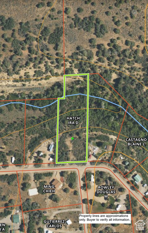 Aerial view of property\'s location with property parcel outlined