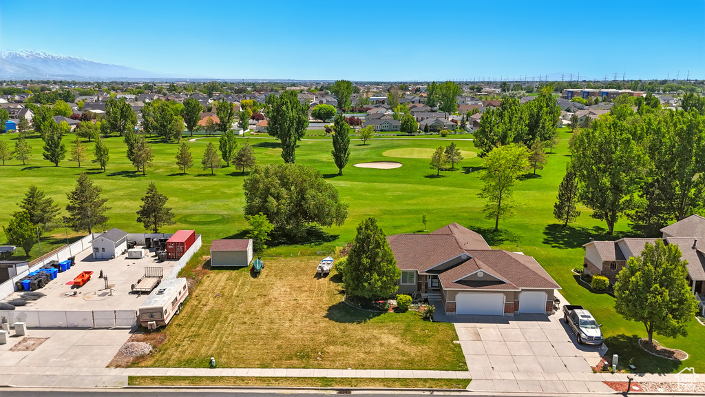 Aerial view of residential area featuring a golf club