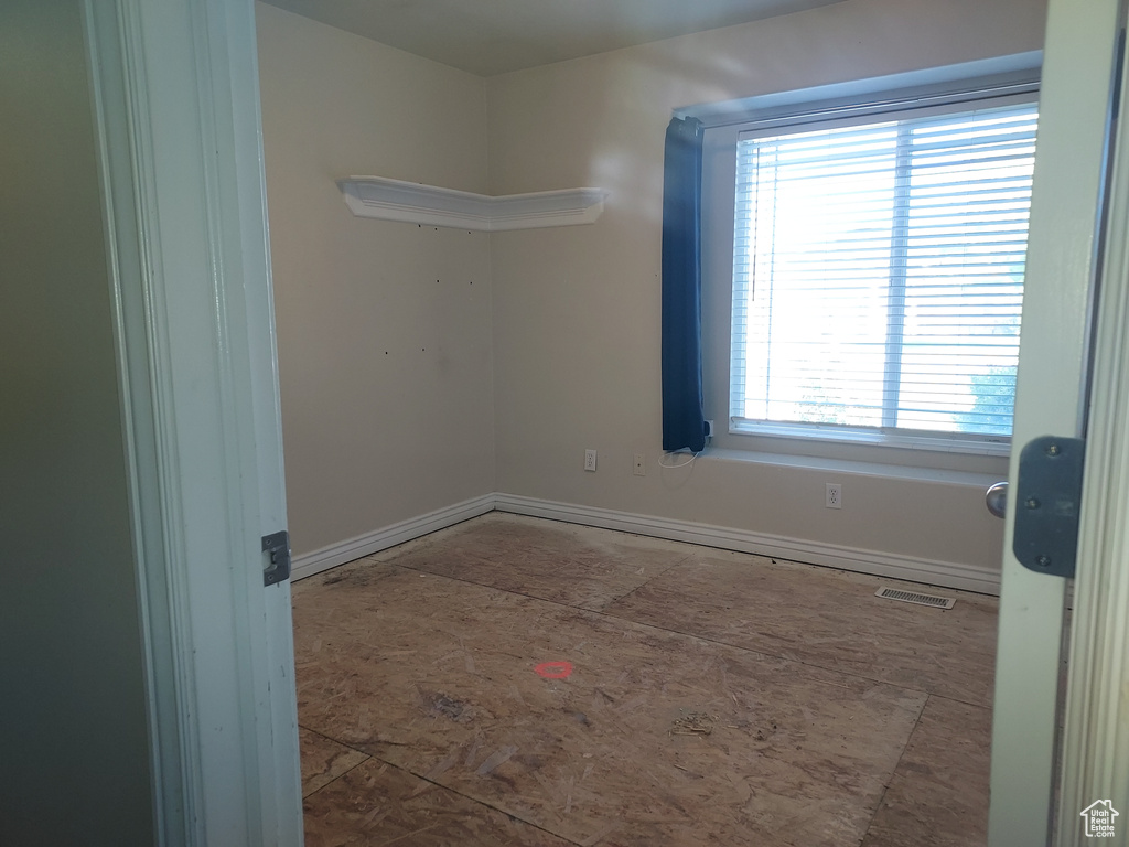 Spare room with baseboards