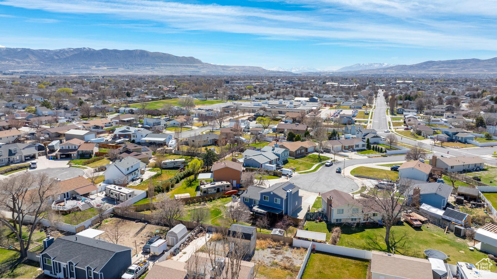 Aerial view of residential area with mountains