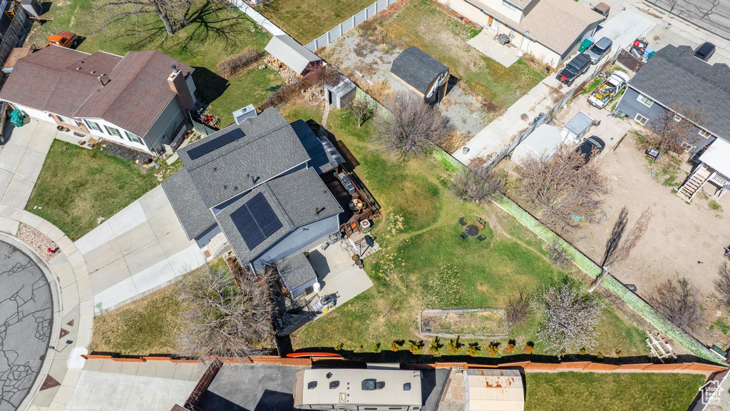 Aerial overview of property's location with nearby suburban area