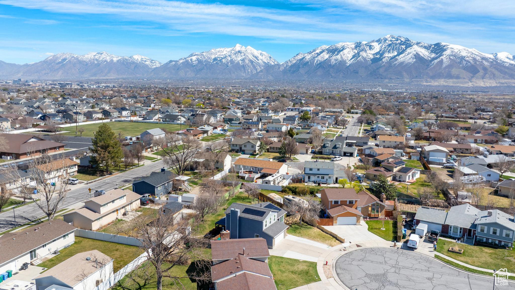 Aerial view of residential area with a mountain backdrop