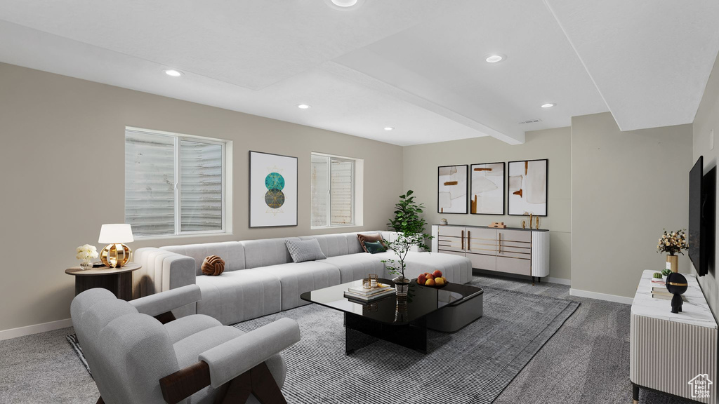 Living area with carpet, baseboards, recessed lighting, and beam ceiling