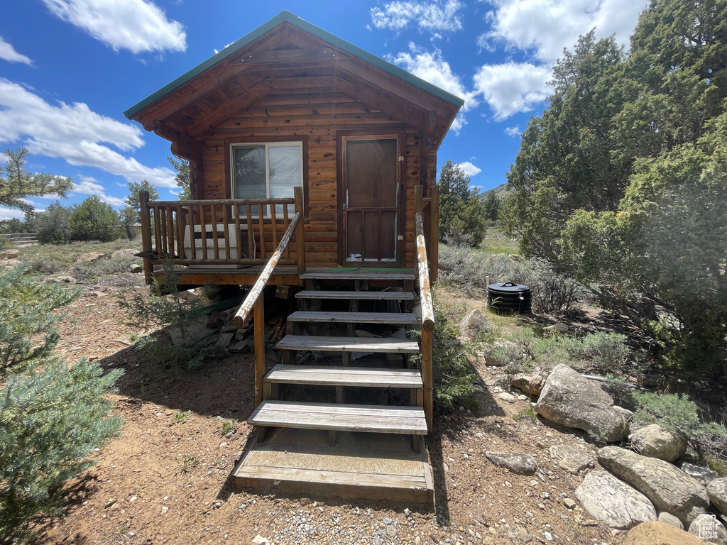 View of front of home with a deck