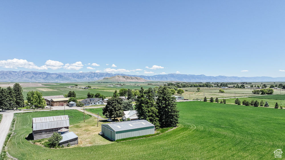 View of mountain backdrop featuring rural landscape and extensive farmland