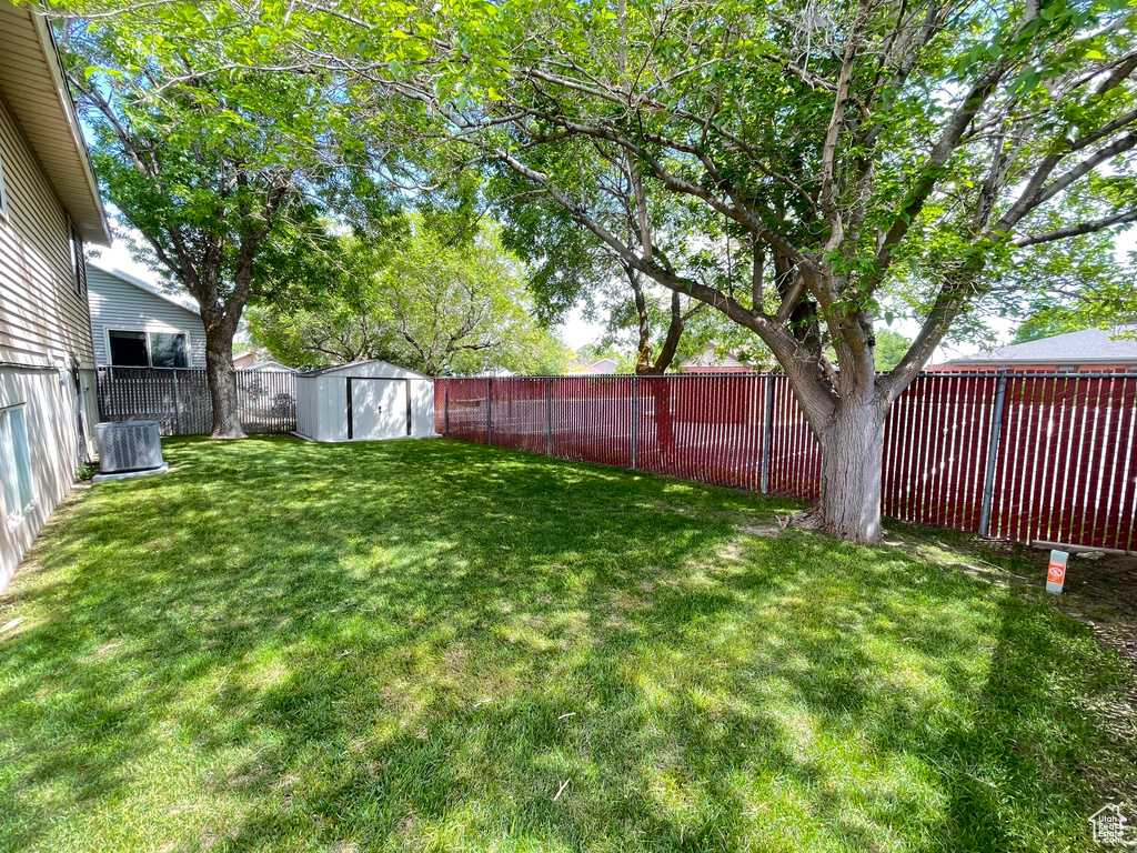 View of yard featuring central AC unit