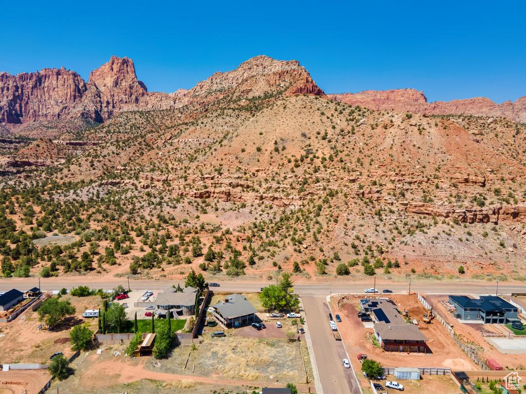 View of mountain backdrop featuring a desert landscape