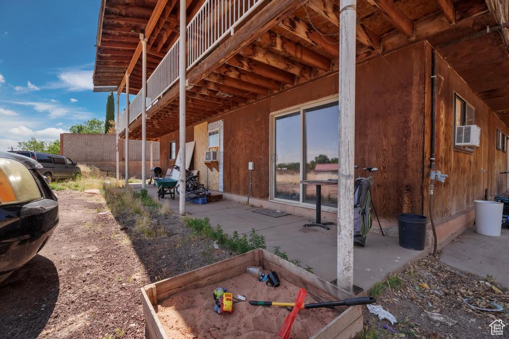 View of patio with a deck