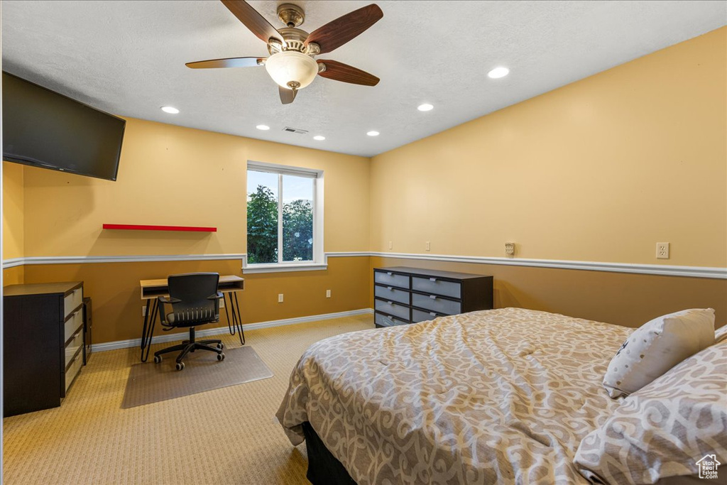 Bedroom featuring carpet flooring, baseboards, recessed lighting, a desk, and ceiling fan