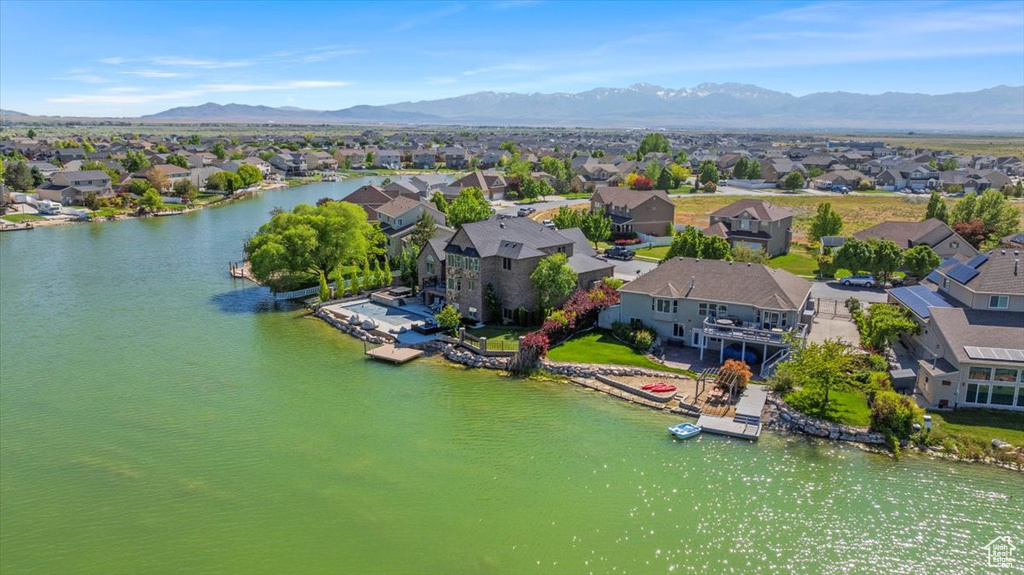 Aerial view of residential area featuring a water and mountain view